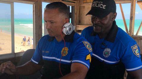 Miami Beach police DJing in a lifeguard booth on Miami Beach in March 2018.