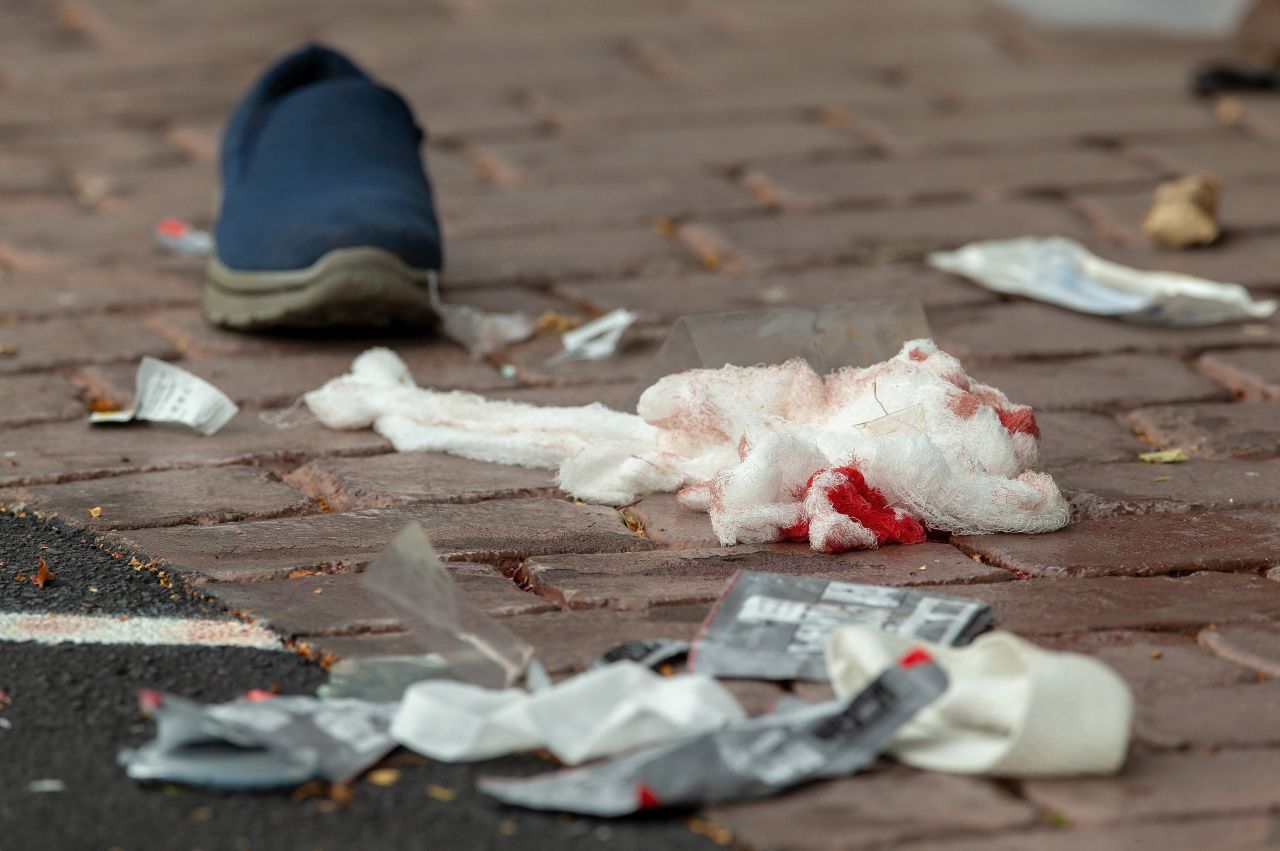Bloodied bandages litter the road on Deans Avenue.