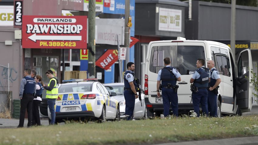 Police stand outside a mosque in Linwood, Christchurch, New Zealand, Friday, March 15, 2019. Multiple people were killed during shootings at two mosques full of people attending Friday prayers. (AP Photo/Mark Baker)