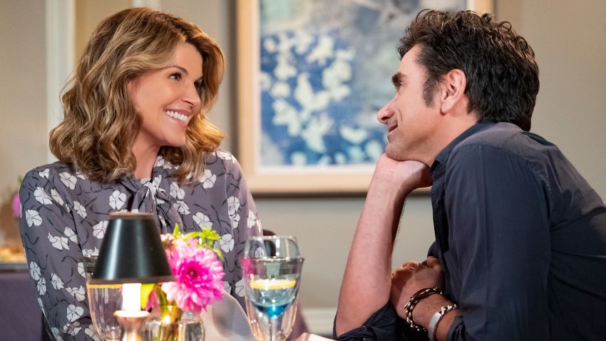 Lori Loughlin and John Stamos appear in episode eight, season 4 of "Fuller House" on Netflix.