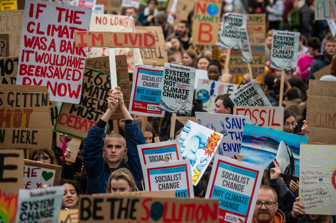 Students take part in a student climate protest on March 15, 2019 in London. 