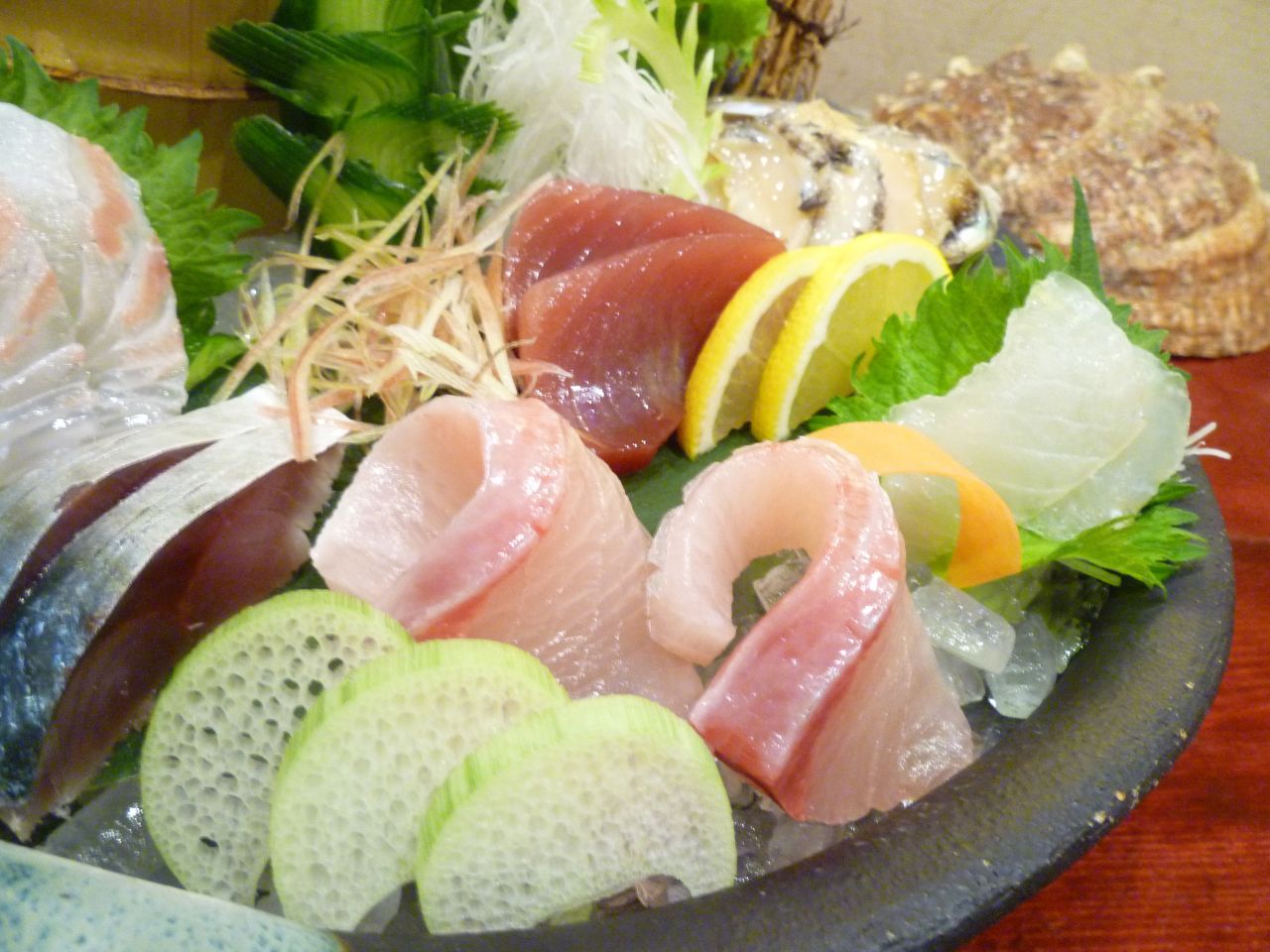 No trip to Japan would be complete without sampling the range of culinary delights the country has to offer. Sashimi -- sliced raw fish -- is a national delicacy. 