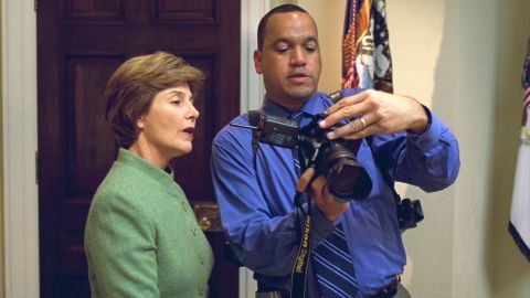 Bush family photographer Eric Draper and former first lady Laura Bush.