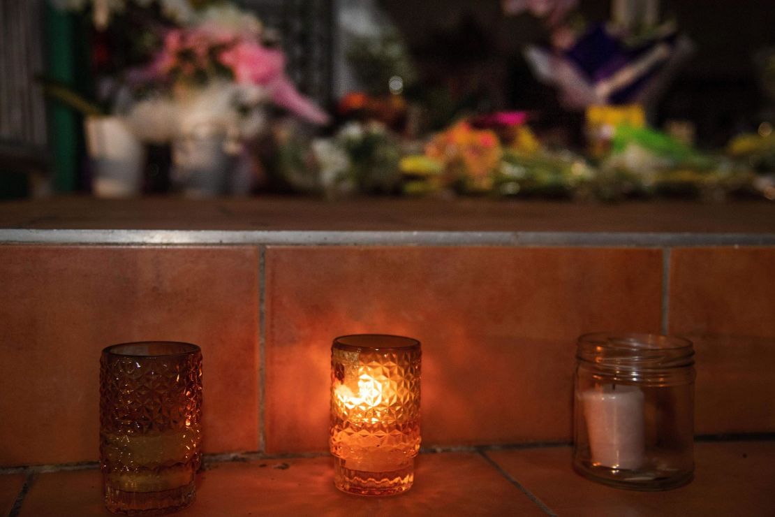 Flowers and candles on the front steps of the Kilbirnie Mosque in Wellington, New Zealand, on Friday.