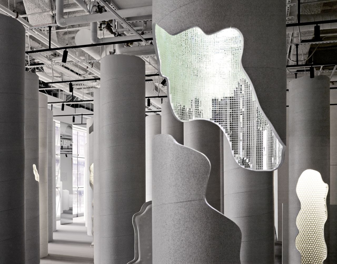 The naturally lit space spans over 6,000 square feet. Each hollowed out pillar features unique materials and designs.