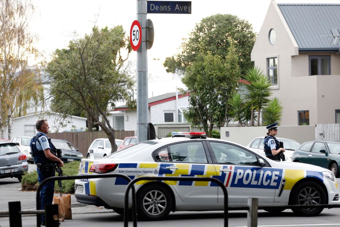Police officers secure the area in front of the Masjid al Noor mosque after a shooting in Christchurch on Friday.