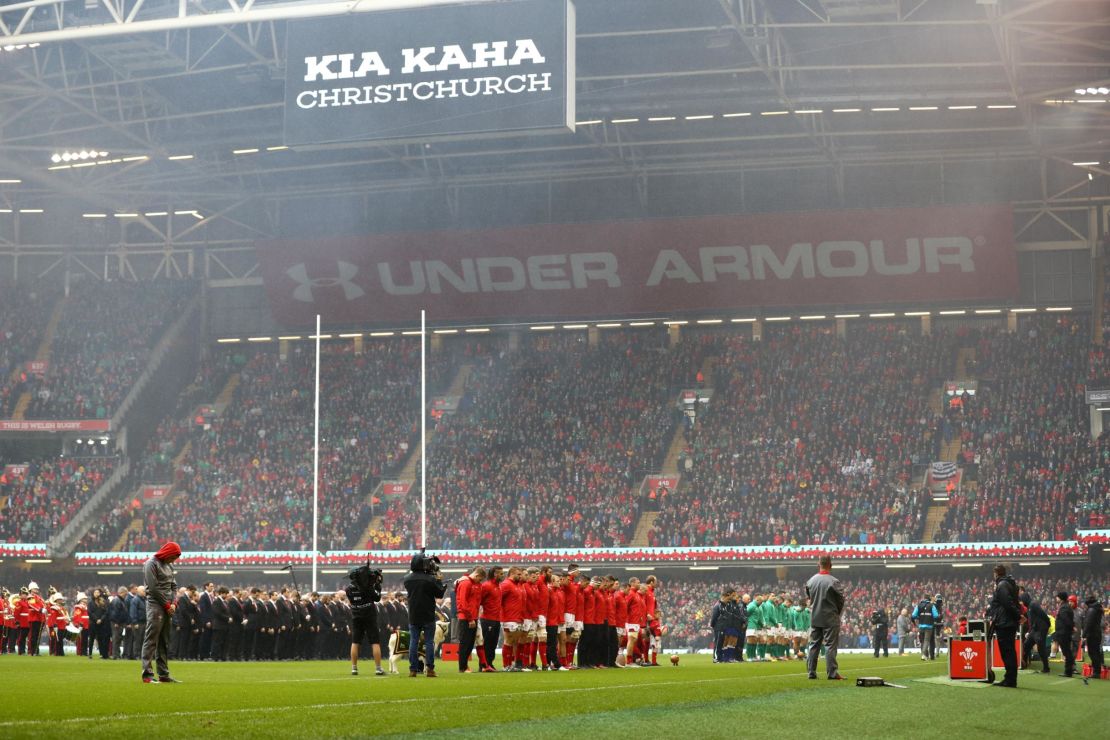 Players observe a minute's silence for the victims of a mass shooting in New Zealand.