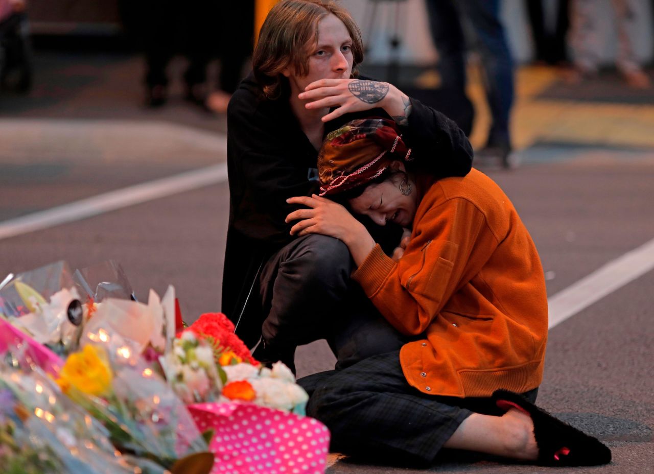 Mourners pay their respects at a makeshift memorial near the Al Noor mosque in Christchurch, New Zealand, on March 16.