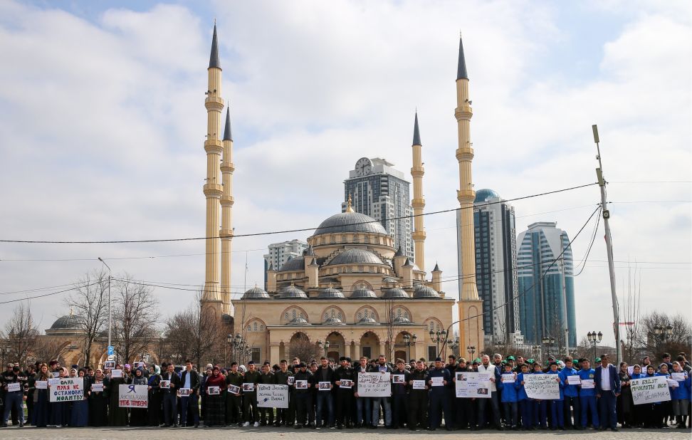 People take part in a memorial to the Christchurch victims in central Grozny, in the Russian region of Chechnya.