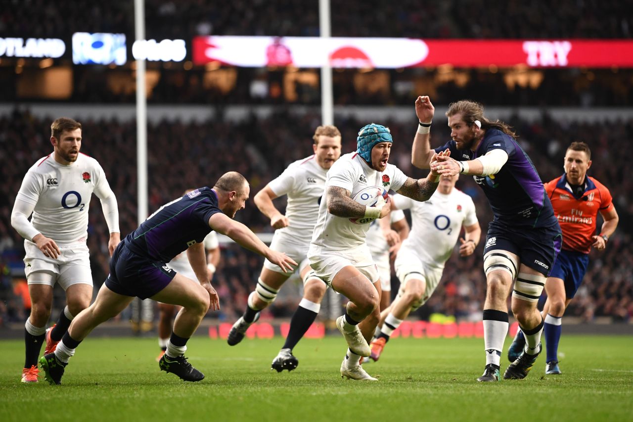 The title had been won before England took on Scotland but the men in white exploded out of the blocks. Jack Nowell threaded his way over for England's opener at Twickenham. 