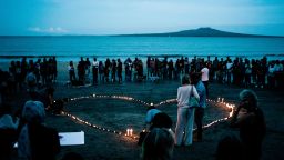 AUCKLAND, NEW ZEALAND - MARCH 16: Crowds gather on Takapuna beach for a vigil in memory of the victims of the Christchurch mosque terror attacks on March 16, 2019 in Auckland, New Zealand. 49 people are confirmed dead, with 36 injured still in hospital following shooting attacks on two mosques in Christchurch on Friday, 15 March. 41 of the victims were killed at Al Noor mosque on Deans Avenue and seven died at Linwood mosque. Another victim died later in Christchurch hospital. A 28-year-old Australian-born man, Brenton Tarrant, appeared in Christchurch District Court on Saturday charged with murder. The attack is the worst mass shooting in New Zealand's history. (Photo by Cam McLaren/Getty Images)