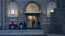 Pedestrians pass a Deutsche Bank AG bank branch in Frankfurt, Germany, on Thursday, March 7, 2019. Deutsche Bank AG and Commerzbank are intensifying informal merger talks as their turnaround efforts sputter, according to a person familiar with the matter. Photographer: Jasper Juinen/Bloomberg via Getty Images