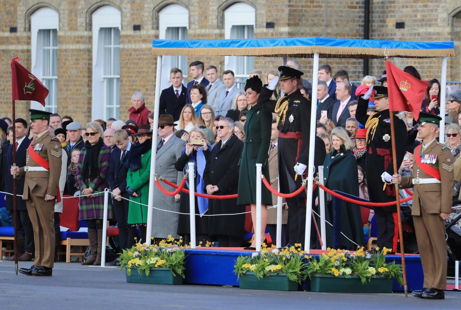 Catherine, Duchess of Cambridge, and Prince William, Duke of Cambridge, observe a moment of silence for the victims of the attacks in Christchurch during the 1st Battalion Irish Guards St. Patrick's Day Parade at Cavalry Barracks on March 17.