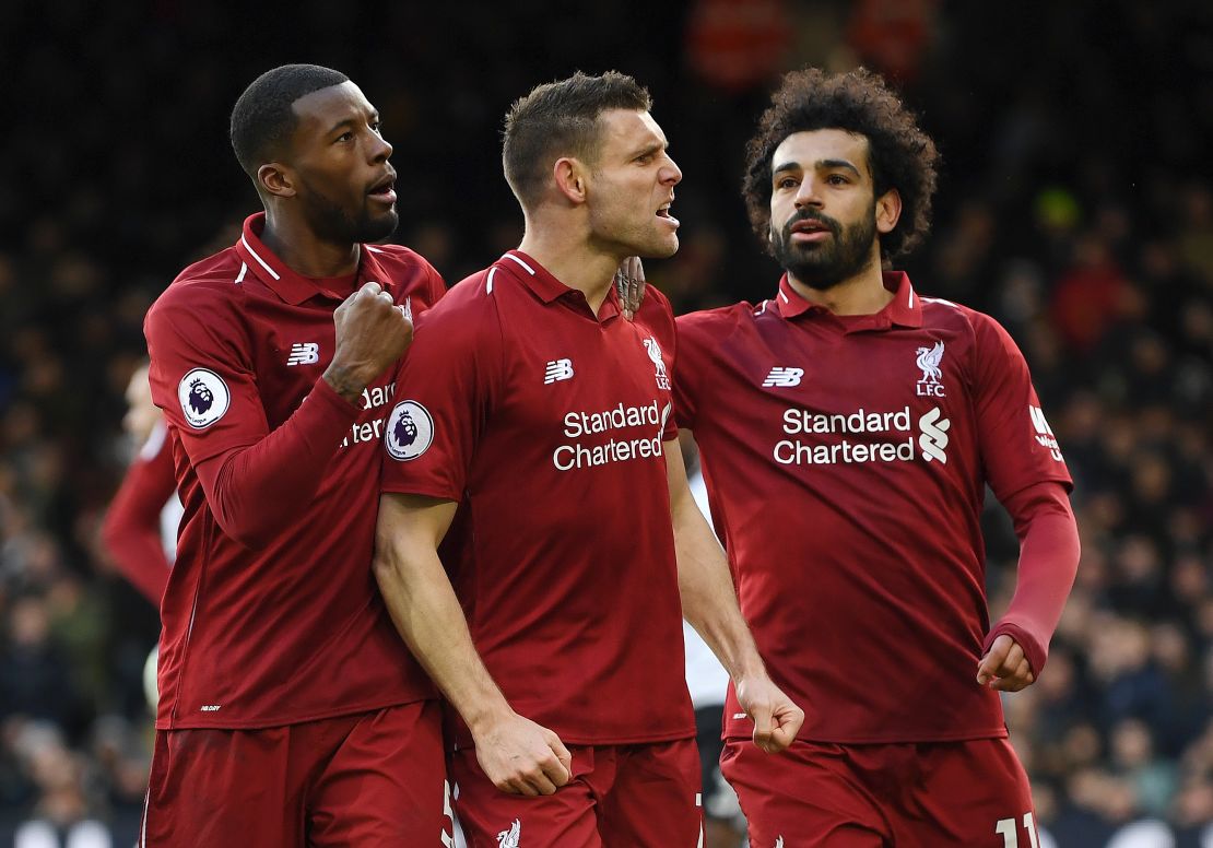 James Milner celebrates after his penalty gave Liverpool the win against Fulham.