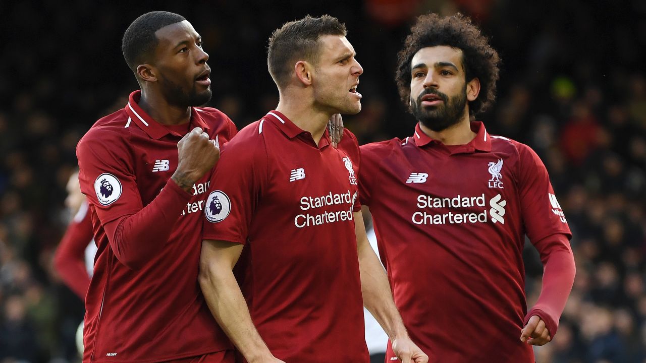 James Milner celebrates after his penalty gave Liverpool the win against Fulham.