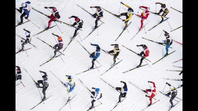 Athletes participate in the 51st annual Engadin skiing marathon in St. Moritz, Switzerland, on Sunday, March 10.