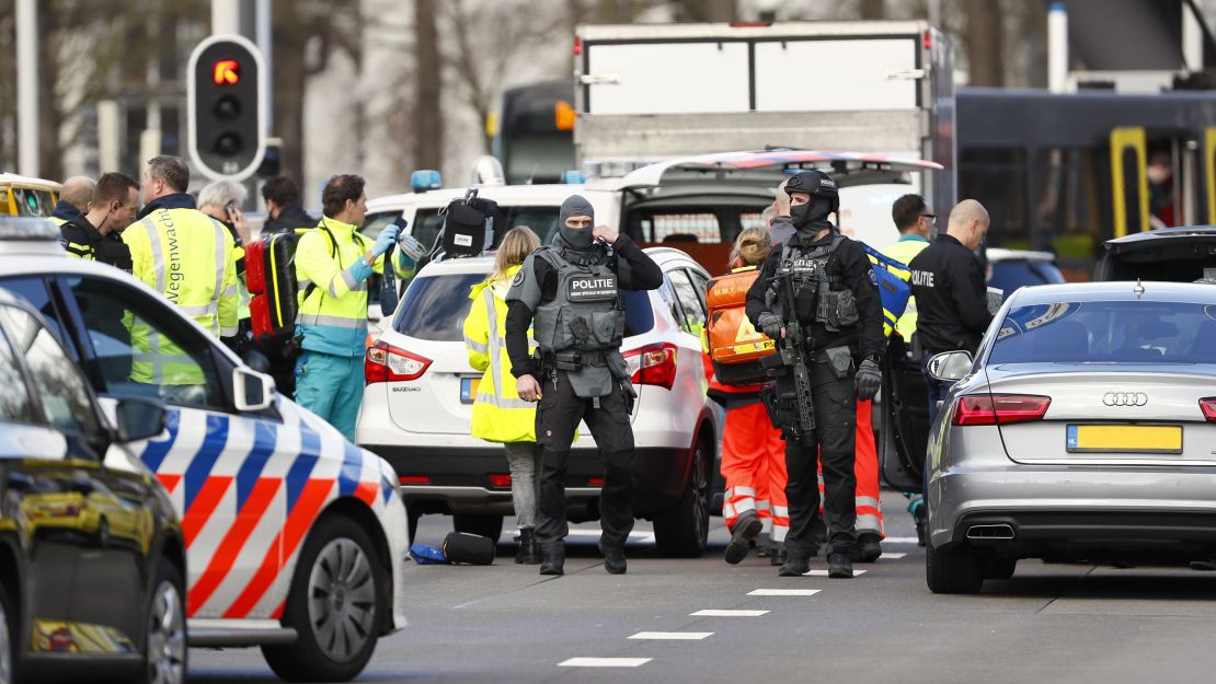 Police officers at the scene of a shooting on a tram in Utrecht's 24 October Square.