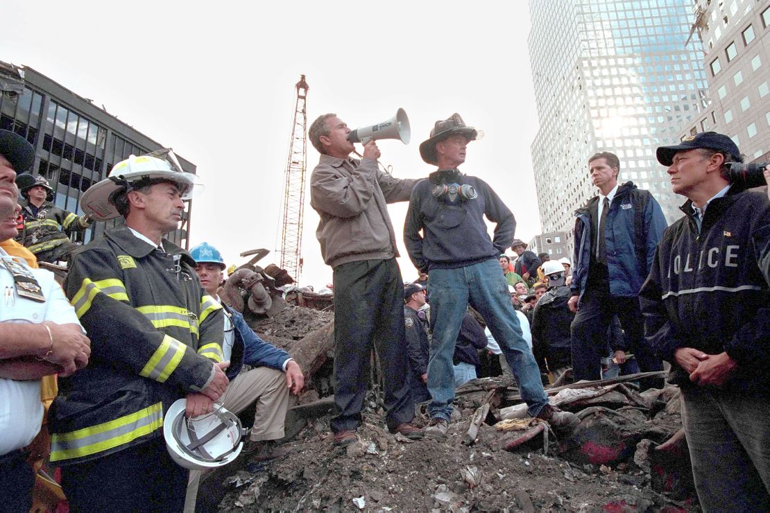 Draper also shot this iconic image of Bush at ground zero, a few days after the 9/11 attacks. 