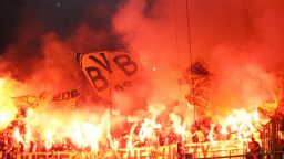 BRUGGE, BELGIUM - SEPTEMBER 18:   Borussia Dortmund fans light flares during the Group A match of the UEFA Champions League between Club Brugge and Borussia Dortmund at Jan Breydel Stadium on September 18, 2018 in Brugge, Belgium.  (Photo by Dean Mouhtaropoulos/Getty Images)