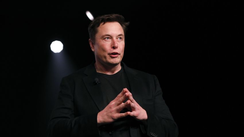 Elon Musk, co-founder and chief executive officer of Tesla Inc., speaks during an unveiling event for the Tesla Model Y crossover electric vehicle in Hawthorne, California, U.S., on Friday, March 15, 2019. Musk said the cheaper electric crossover sports utility vehicle (SUV) will be available from the spring of 2021. The vehicle's price will start at $39,000, a longer-range version will cost $47,000. Photographer: Patrick T. Fallon/Bloomberg via Getty Images
