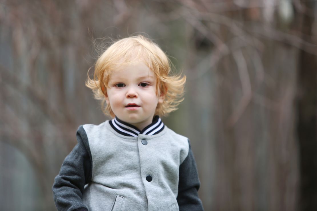 Jude McGee, who died of the flu at age two. His mother, Jill Promoli, has suffered abuse from anti-vaxers.