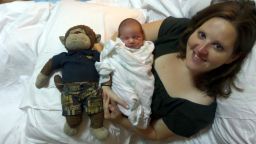 Stephanie Hathaway holding her firstborn child, Hadley