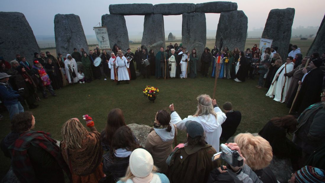 <strong>Stonehenge. </strong>The famous Neolithic structure Stonehenge is the gathering place for pagans, druids and the plain curious during spring equinox. Here, celebrants wait for the sun to rise at Stonehenge on March 20, 2009, near Amesbury in Wiltshire, England. 