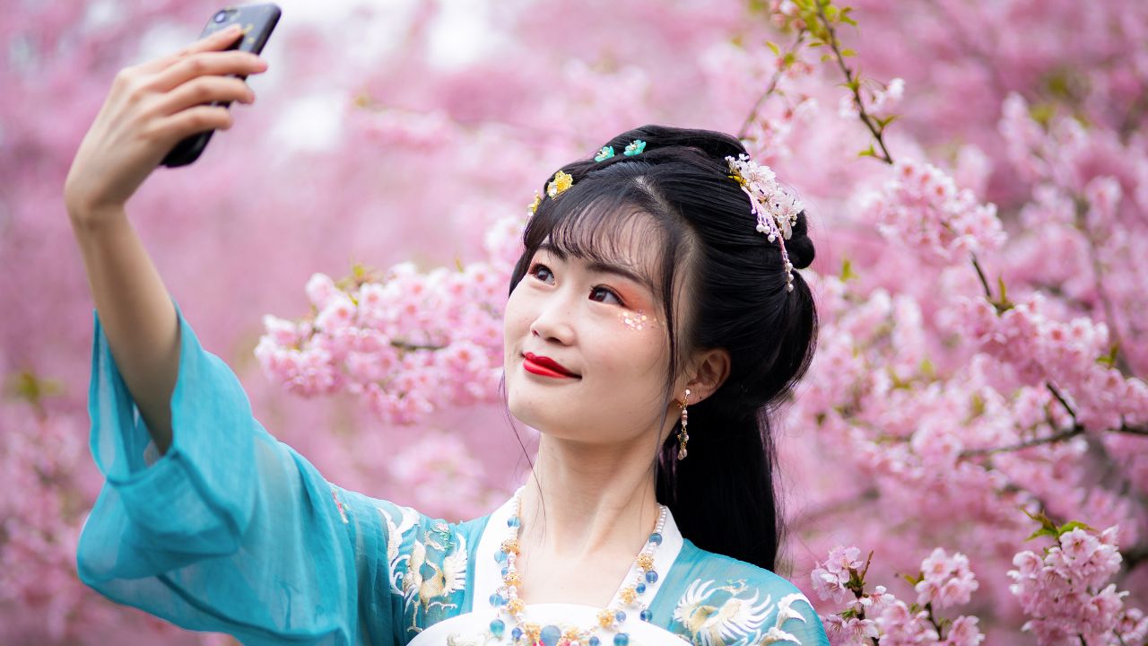 <strong>Cherry blossoms. </strong>The arrival of spring is marked in Nanjing, China, and many other areas with a festive period celebrating the beautiful cherry blossoms. Here, a tourist takes a selfie at Nanjing Zhongshan Botanical Garden on March 17, 2019.