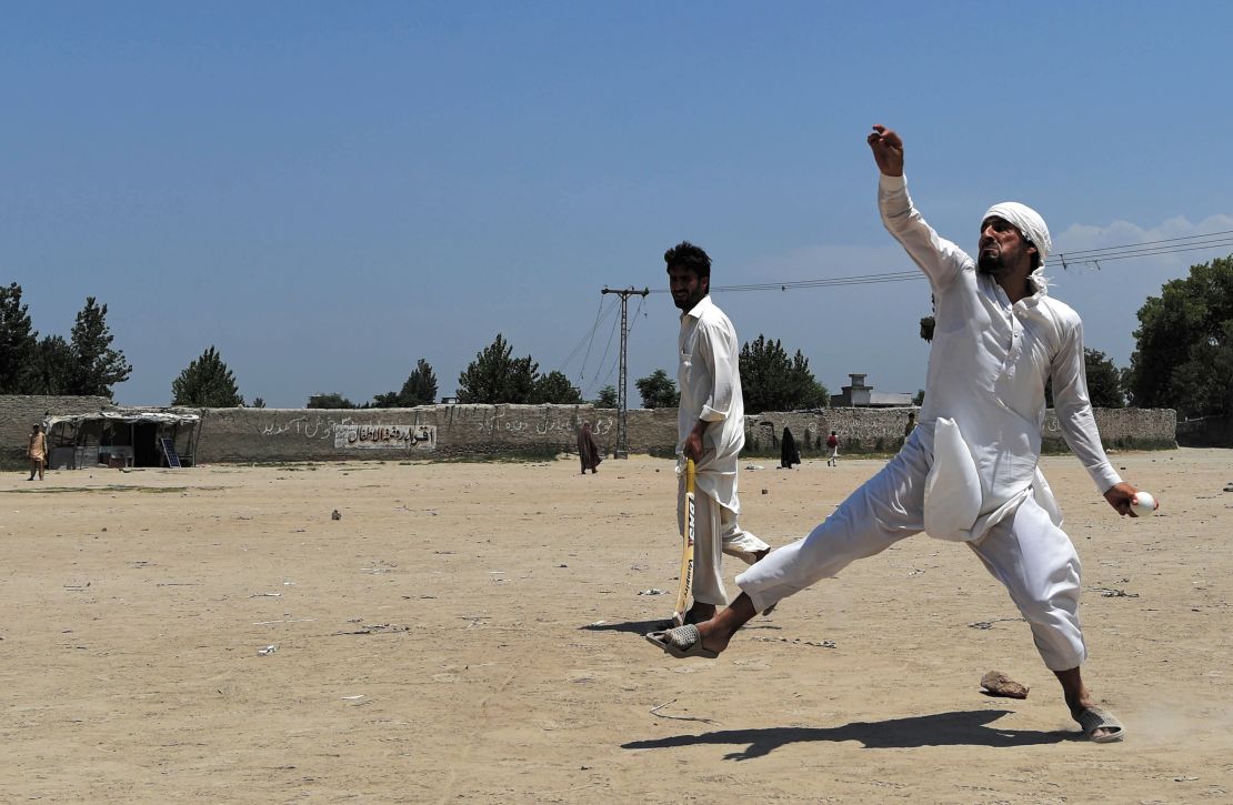 Afghan refugees play together at the Khurasan refugee camp in the suburbs of Peshawar, near the historic Khyber Pass, close to the border with Afghanistan.