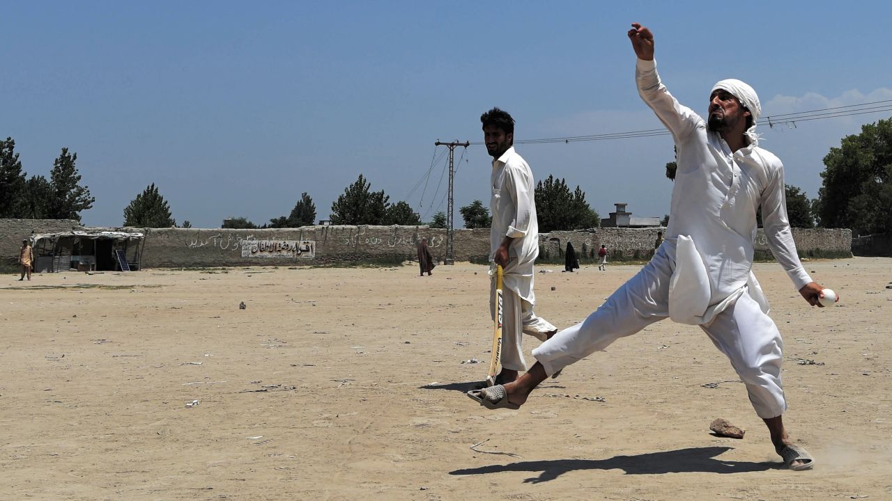Afghan refugees play together at the Khurasan refugee camp in the suburbs of Peshawar, near the historic Khyber Pass, close to the border with Afghanistan.