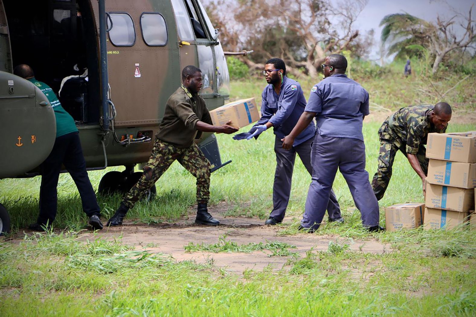 South Africa National Defense Forces personnel deliver relief aid in Buzi on March 20.