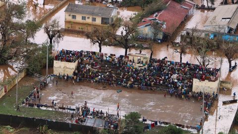 Residents stranded on the stands of a stadium in a flooded area of Buzi, Mozambique, on March 20.