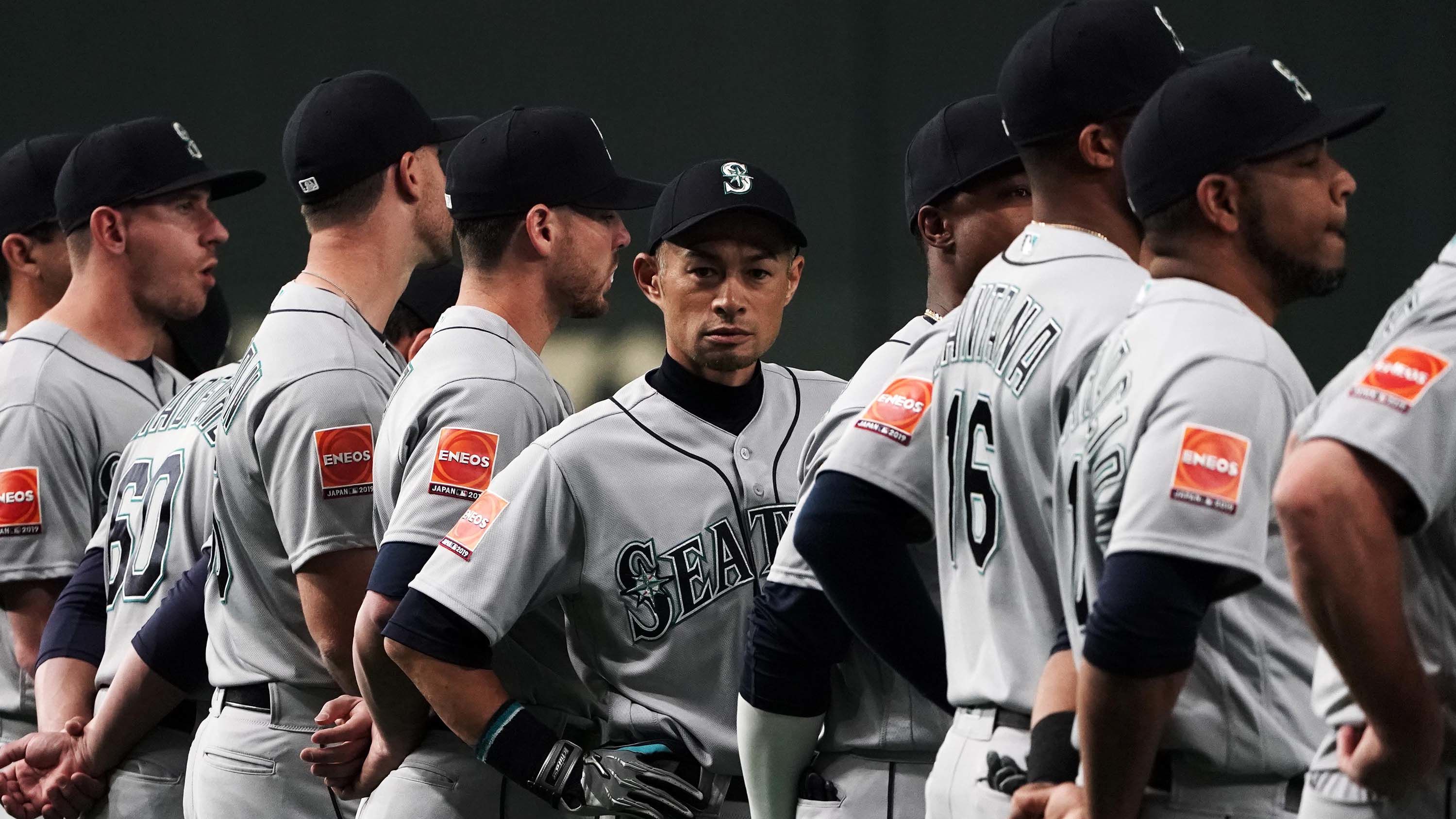 Ichiro lines up with his teammates for the national anthems prior to Wednesday's game.
