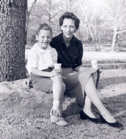 A young Warren sits with her mother, Pauline. "When I was 12, my daddy had a heart attack," <a href="index.php?page=&url=https%3A%2F%2Fwww.facebook.com%2FElizabethWarren%2Fphotos%2Fa.414227908686%2F10154779197633687%2F%3Ftype%3D3%26theater" target="_blank" target="_blank">Warren wrote on Facebook in 2017.</a> "All three of my brothers were off in the military, and Daddy was out of work for a long time. We lost our family station wagon, and we were about an inch away from losing our home. One day, I walked into my mother's room and found her crying. She said, 'We are not going to lose this house.' She wiped her eyes, blew her nose, and pulled on her best dress -- the one she wore to funerals and graduations. At 50 years old, she walked down the street and got her first paying job: answering the phones at Sears. That minimum wage job saved our home, and my mother saved our family."