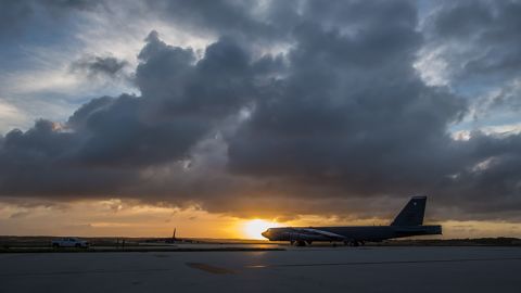 A B-52 Stratofortress taxis down the flightline as the sun sets over Andersen Air Force Base, Guam, March 18, 2019. 