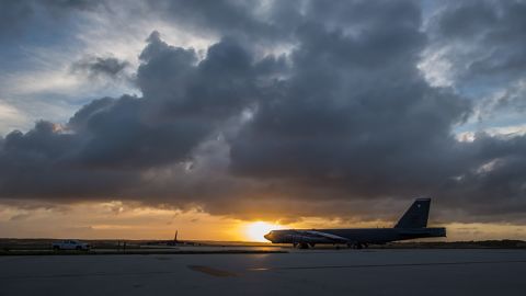 A B-52 Stratofortress taxis down the flightline as the sun sets over Andersen Air Force Base, Guam, March 18, 2019.