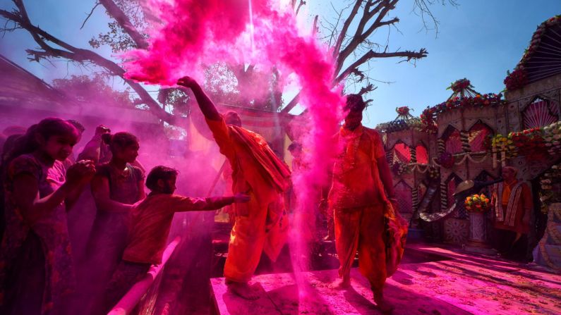 <strong>Mathura, India: </strong>Revelers<strong> </strong>cover each other in colorful powders during the ancient Hindu festival of Holi, a two-day event held across India and Nepal which celebrates the beginning of spring and the triumph of good over evil. Click through <a href="index.php?page=&url=https%3A%2F%2Fcnn.com%2Ftravel" target="_blank">CNN Travel</a>'s gallery for more of the world's best travel photos that we'll collect and display in 2019: