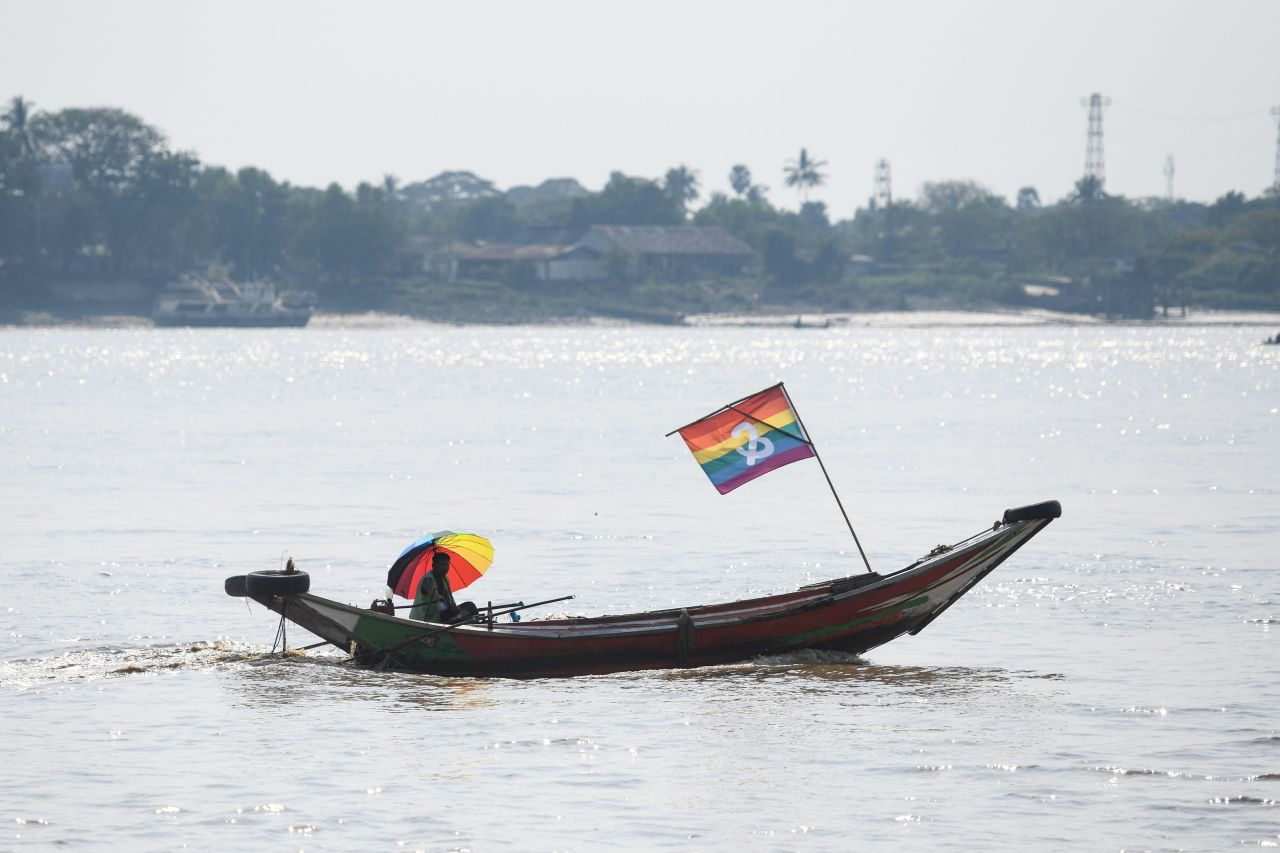 <strong>Yangon, Myanmar. </strong>A wooden boat displaying a rainbow flag is part of the Pride boat parade, part of Yangon's Pride festival in January 2019.