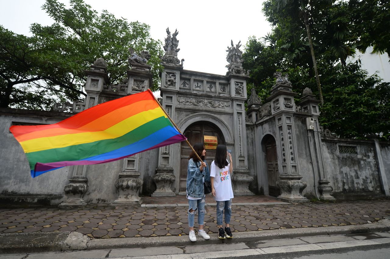 <strong>Hanoi, Vietnam. </strong>A girl waves a rainbow flag during a Pride parade in Hanoi in November 2018.