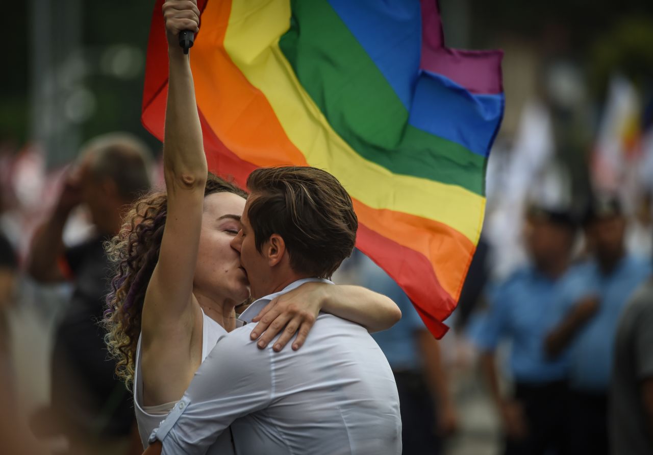 <strong>Bucharest, Romania. </strong>Two women kiss as they take part in Bucharest Pride 2018 in June. 