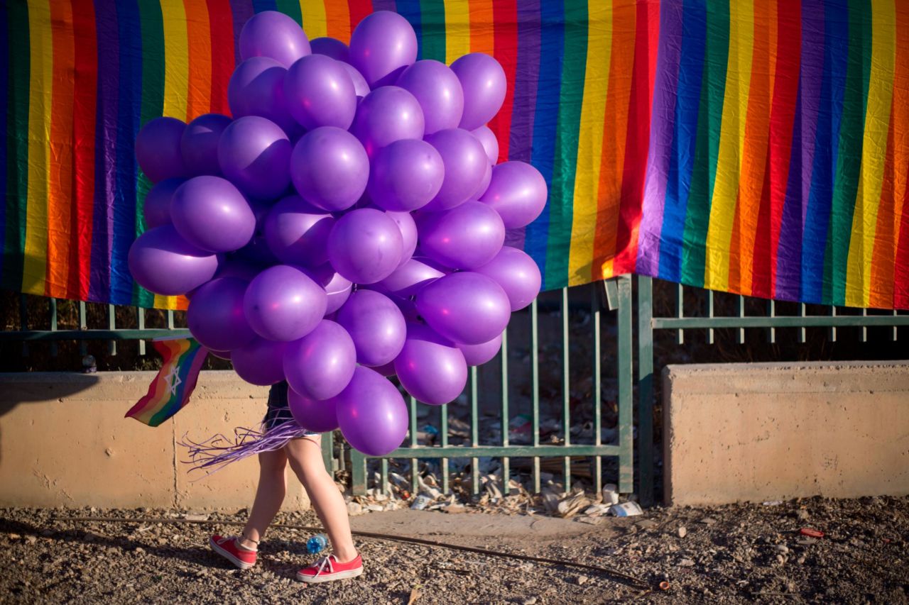 <strong>Beersheba, Israel. </strong>A woman holds balloons as she participates in the city's first Gay Pride Parade in June 2017, when about 3,500 people marched.