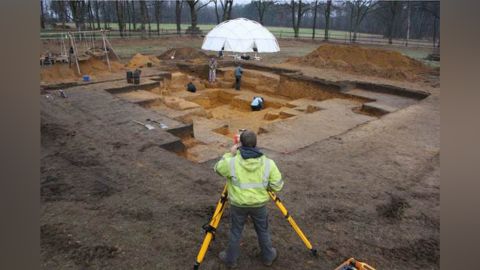 Tents with heaters are used to thaw frozen ground before archaeologists can begin excavation.