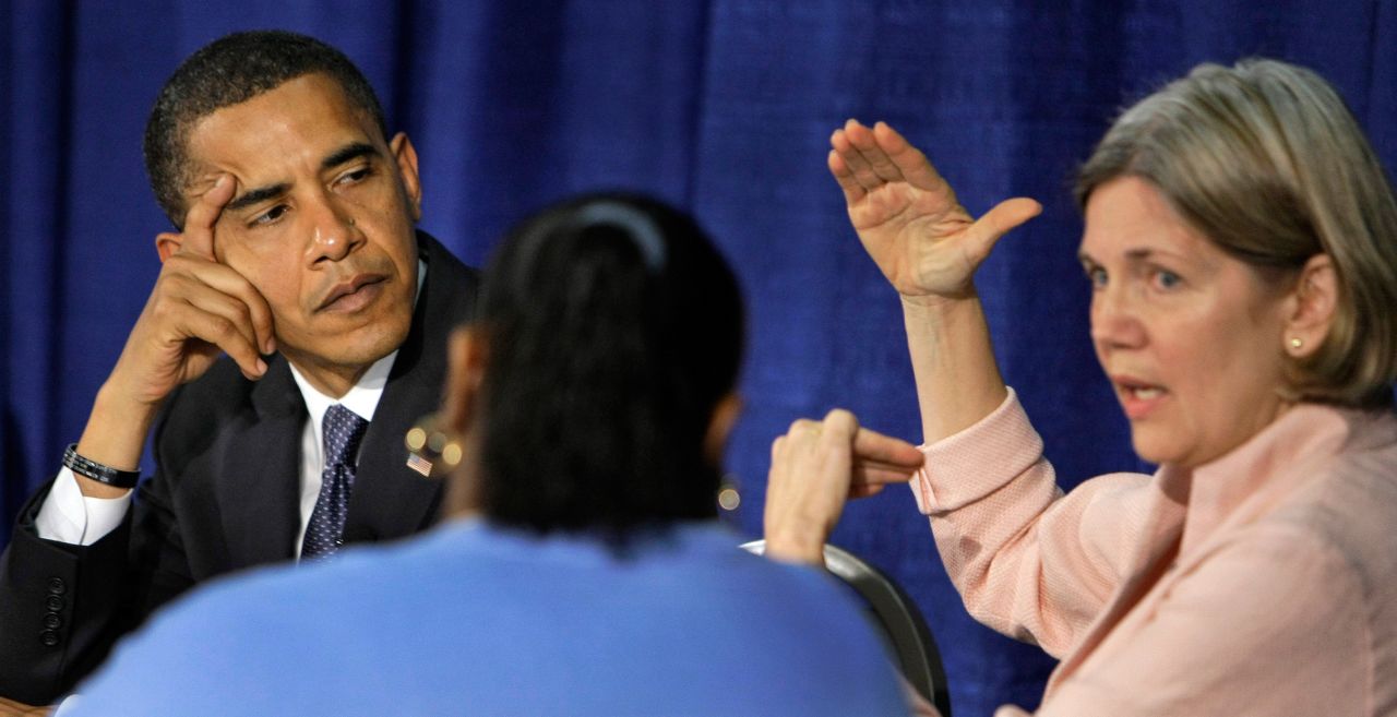 US Sen. Barack Obama listens to Warren speak during a roundtable discussion about predatory lending in 2008. Warren is an expert on bankruptcy law and was an adviser to the National Bankruptcy Review Commission in the 1990s. In 1989, Warren co-authored the book "As We Forgive Our Debtors: Bankruptcy and Consumer Credit in America."