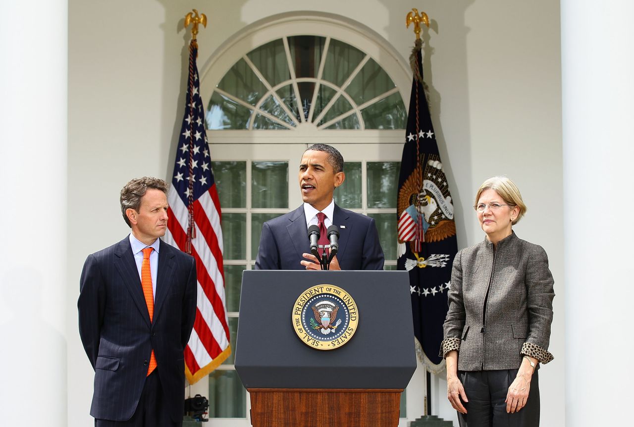 Warren and Treasury Secretary Timothy Geithner listen to President Barack Obama at the White House in September 2010. Obama was appointing Warren to be his assistant and special adviser to the Treasury Secretary in order to launch the Consumer Financial Protection Bureau. Warren had long called for a federal agency designed to protect consumers from fraudulent or misleading financial products.