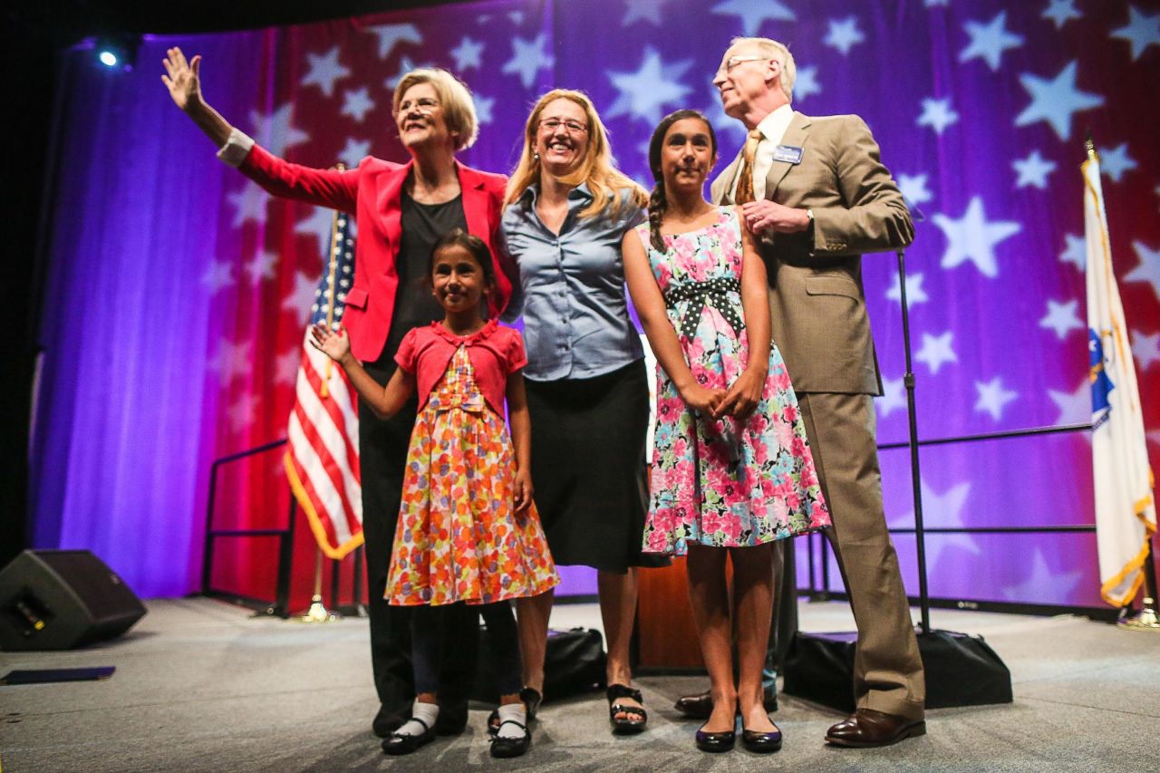 Warren stands with family members after giving a speech in Springfield, Massachusetts, in June 2012. Warren has several grandchildren.