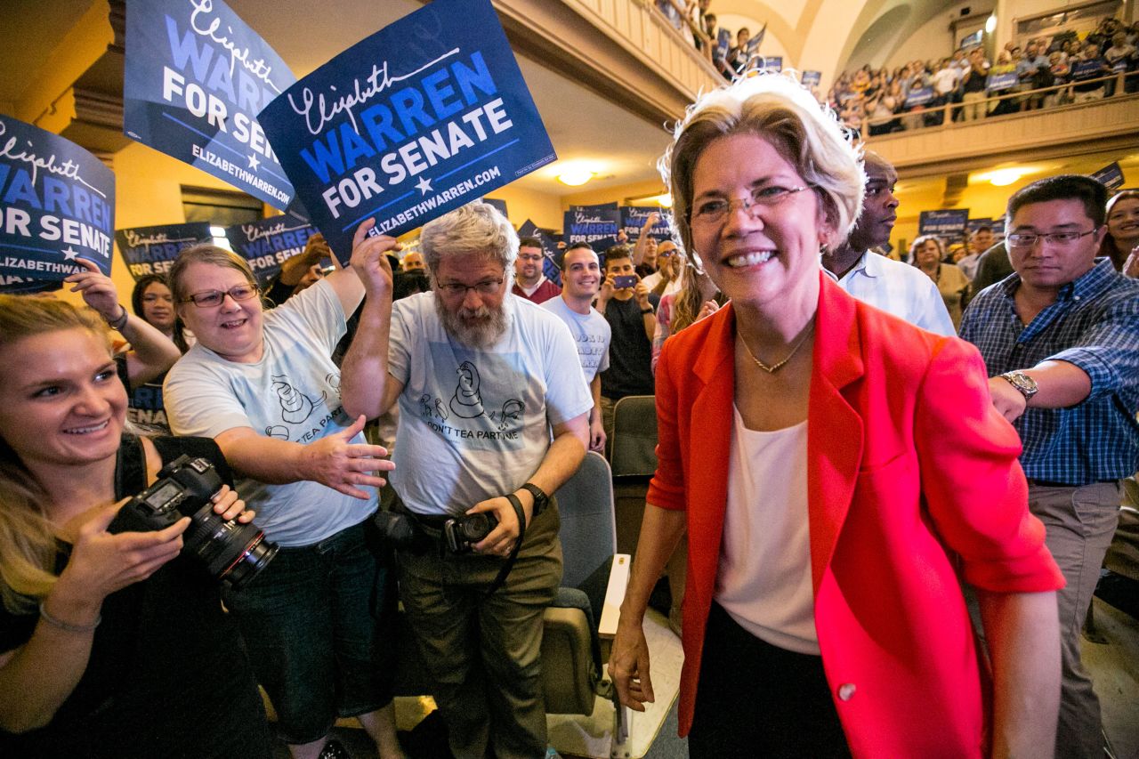 Warren greets supporters during a campaign event at Boston University.
