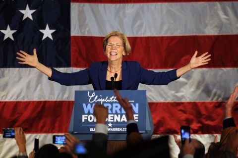 Warren takes the stage after defeating Brown for a Senate seat in November 2012.