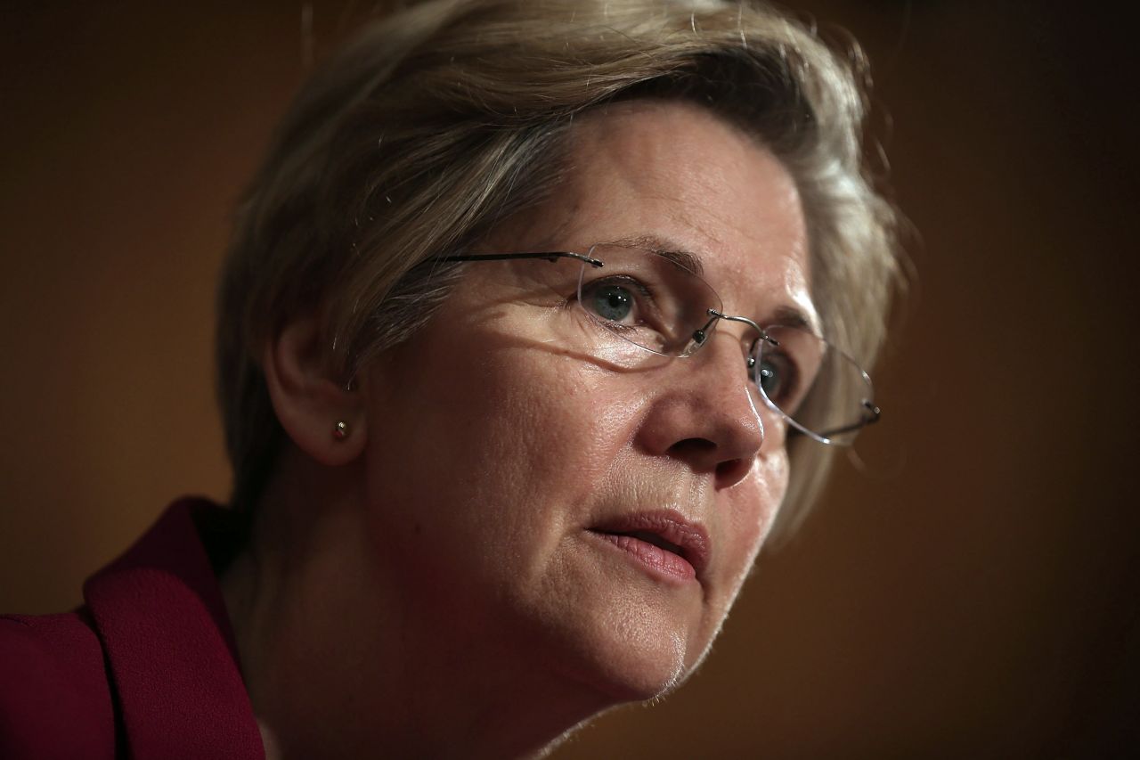 Warren listens during a hearing of the Senate Committee on Banking, Housing and Urban Affairs in May 2013.