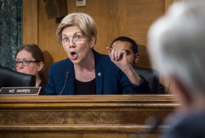 Warren, a member of the Senate Banking Committee, questions Wells Fargo CEO John Stumpf in September 2016. Warren <a href="index.php?page=&url=http%3A%2F%2Fmoney.cnn.com%2F2016%2F09%2F22%2Finvesting%2Fwells-fargo-elizabeth-warren-fair-labor-firings%2F" target="_blank">unleashed a verbal barrage at Stumpf,</a> calling the embattled bank boss "gutless" and demanding he step down. Her diatribe was the most forceful condemnation yet of Wells Fargo, who fired more than 5,000 employees over the years for creating fake accounts without customer knowledge. The employees created the fraudulent accounts to meet bank quotas and were allegedly threatened with firing if they didn't comply.