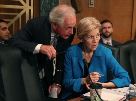US Sen. Bob Corker talks with Warren during a Senate committee hearing in June 2017.